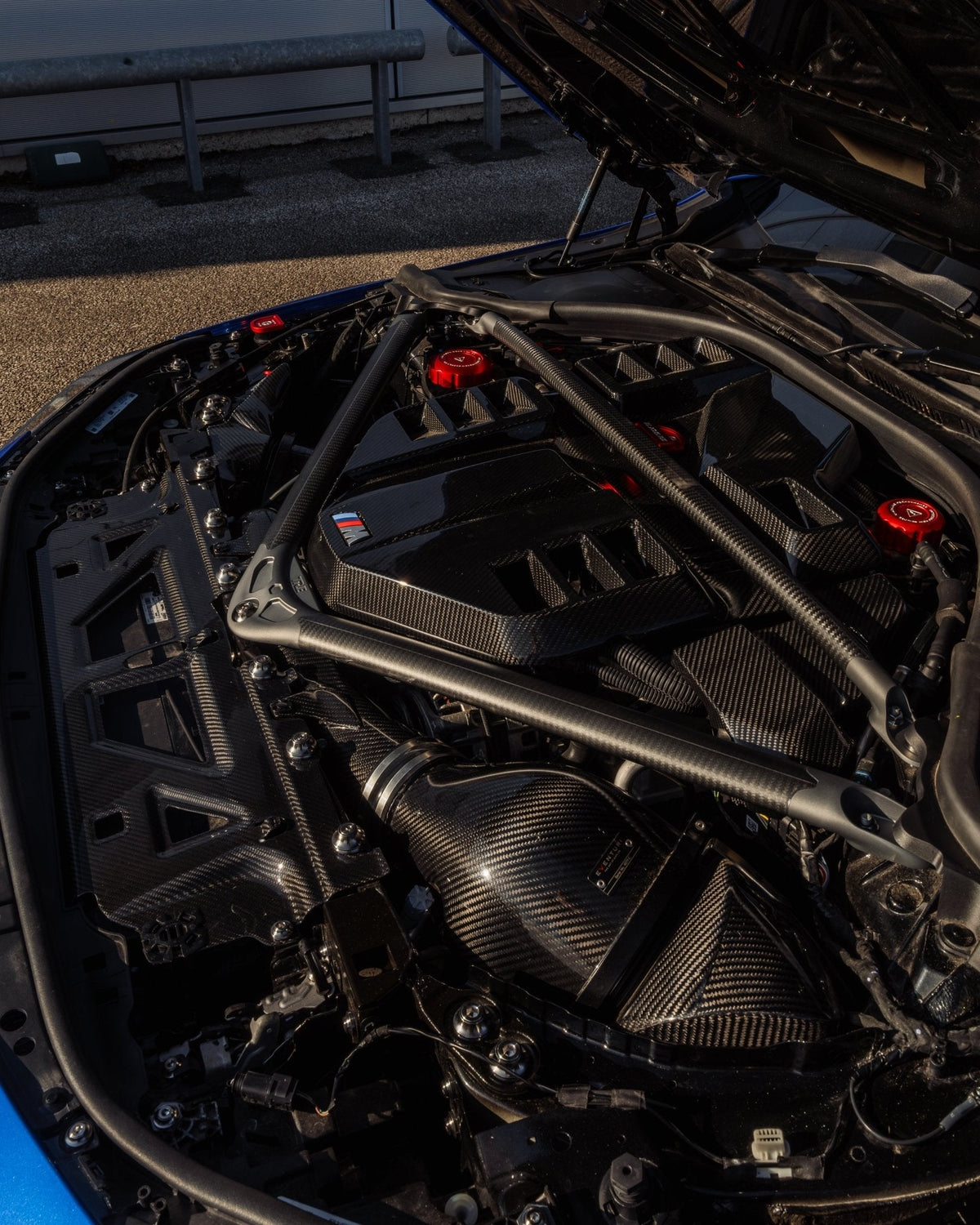 BMW G87 M2, G80 M3 & G82 M4 Pre-Preg Carbon Fibre ECU Battery Terminal Cover by FORM | Forge Automotive